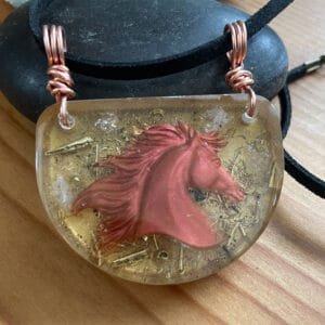 Firehorse-Orgone-Pendant-DrkGold-Red-rocks-1000x1000